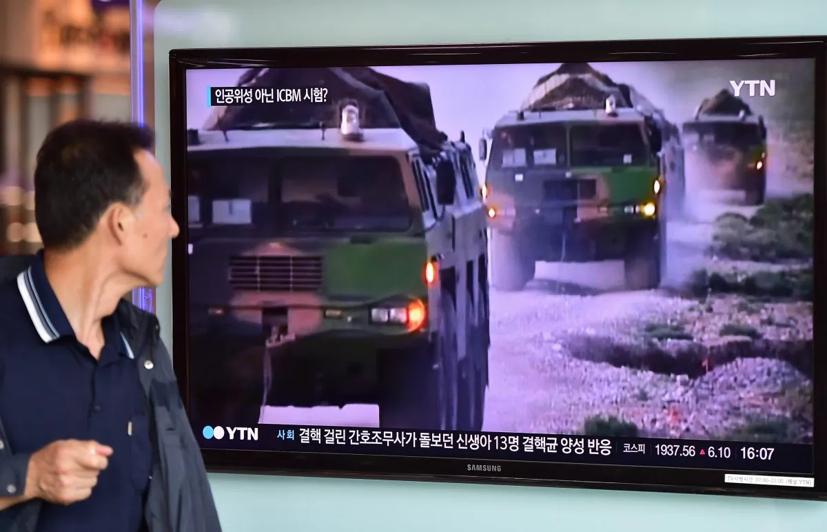 A man watches a news report at a railway station in Seoul on Sept. 15, 2015, on the confirmation from North Korea that the Yongbyon nuclear reactor seen as the country's main source of weapons-grade plutonium had resumed normal operations, raising a further red flag amid growing signs the North may be considering a long-range rocket launch next month in violation of U.N. resolutions. North Korea mothballed the Yongbyon reactor in 2007 under an aid-for-disarmament accord, but began renovating it after its last nuclear test in 2013. (Jung Yeon-je/AFP/Getty Images)