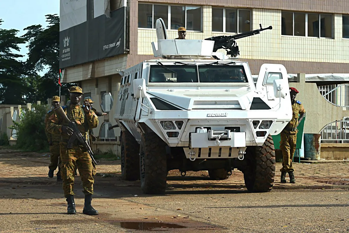 Burkina Faso army troops stand guard outside Guillaume Ouedraogo military camp in Ouagadougou on September 22, 2015. (Sia Kambou/AFP/Getty Images)