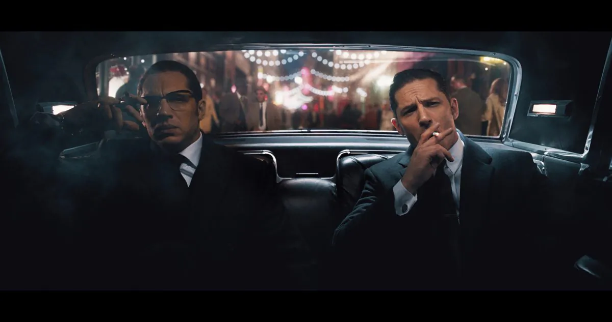 Tom Hardy plays murderous gangster brothers Ronnie (L) and Reggie Kray deftly in "Legend," which means by the end of the film we know they are both awful human beings. (Courtesy of TIFF)