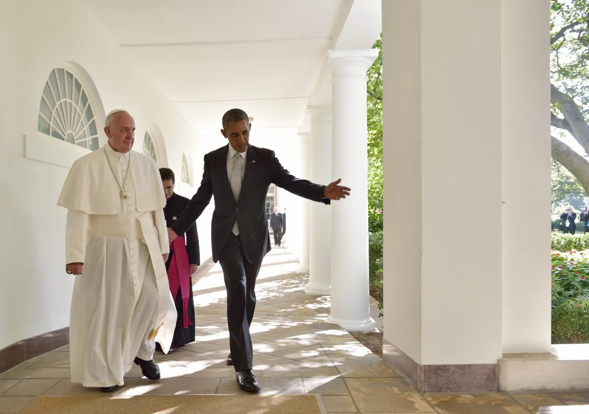 US President Barack Obama and Pope Francis walk through the Colonnade on their way to a bilateral meeting in the Oval Office of the White House on September 23, 2015 in Washington, DC. (Mandel Ngan/AFP/Getty Images)