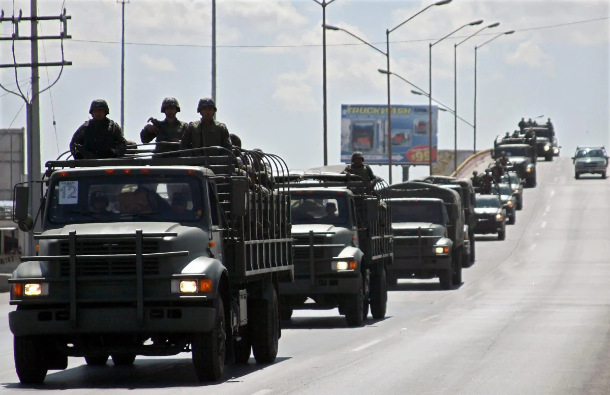 Members of Mexican Army arrive to Ciudad Juárez in northern Mexico, on March 13, 2009. (Jesus Alcazar/AFP/Getty Images)