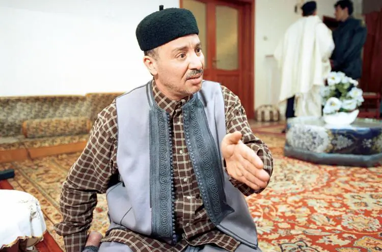 Lockerbie bombing suspect Al-Amin Khalifa Fhimah greets visitors at the Soukal Juima mosque in Tripoli, Libya, on Feb. 2, 2001. (Courtney Kealy/Getty Images)
