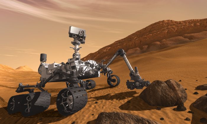 This artist concept features NASA's Mars Science Laboratory Curiosity rover, a mobile robot for investigating Mars' past or present ability to sustain microbial life. (NASA)