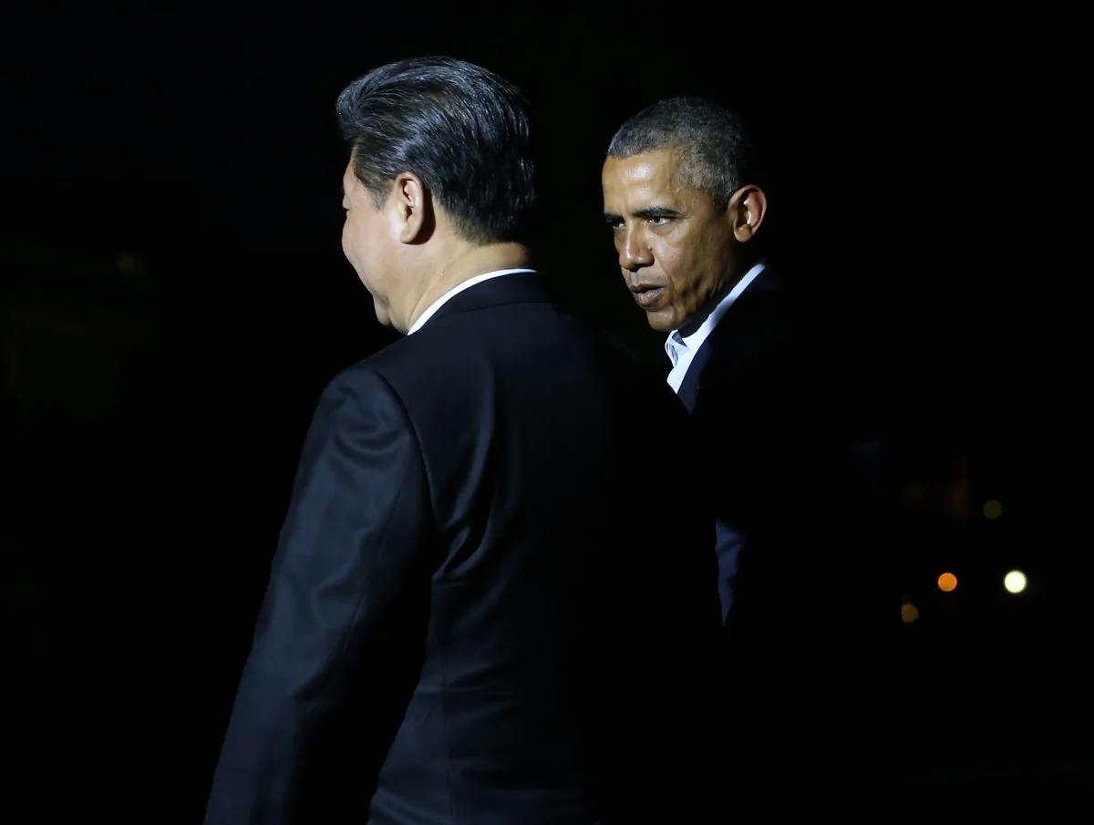 President Barack Obama walks with Chinese leader Xi Jinping on the White House grounds on Thursday. (Mark Wilson/Getty Images)