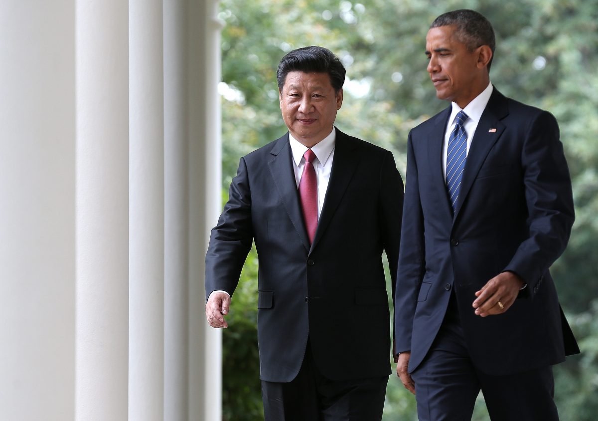 President Barack Obama (R) and Chinese President Xi Jinping (L) arrive for a joint press conference in the Rose Garden at the White House, in Washington, D.C., on Sept. 25, 2015. (Win McNamee/Getty Images)