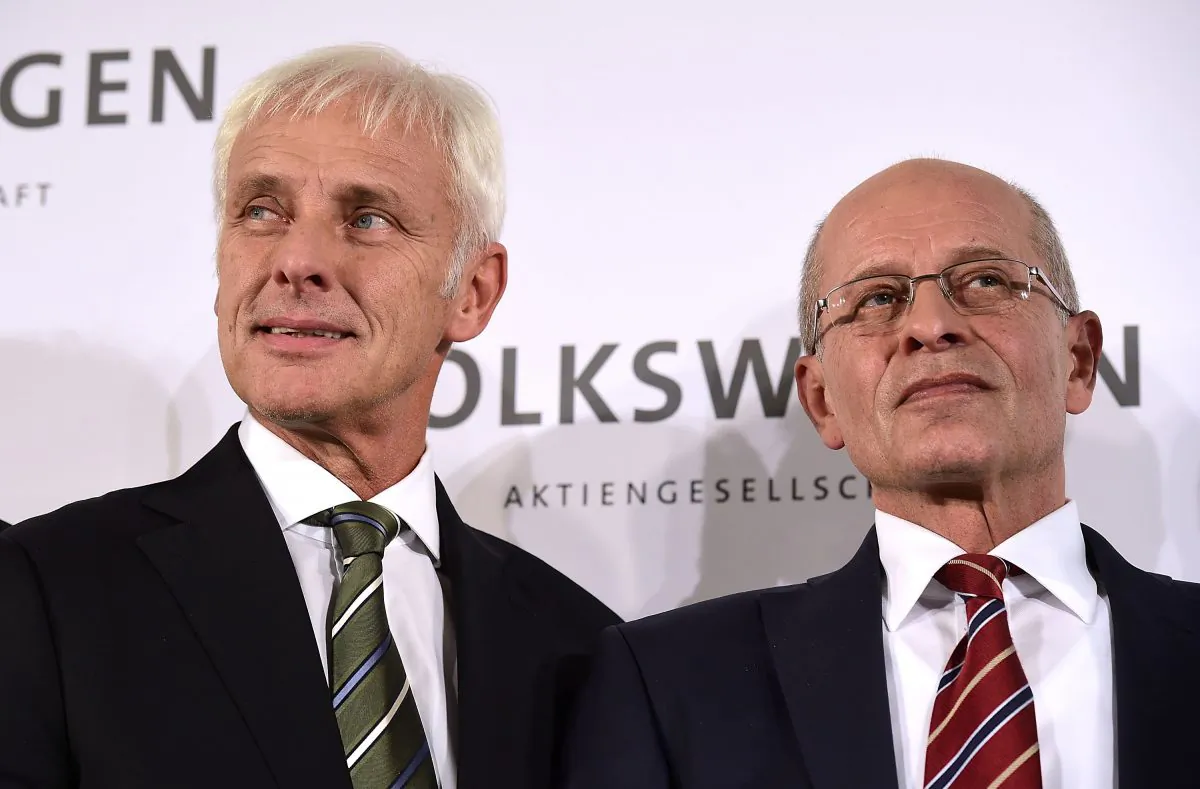 (L-R) Matthias Mueller, head of German automaker Porsche, and acting Chairman Berthold Huber speak to the media after the governing board of Volkswagen announced Mueller will succeed former Volkswagen CEO Martin Winterkorn on September 25, 2015 in Wolfsburg, Germany. (Alexander Koerner/Getty Images)