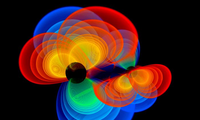 A visualisation of gravitational waves emitted by two orbiting supermassive black holes. (CSIRO, Author provided)