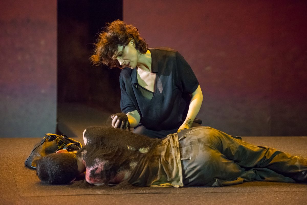 Antigone (Juliette Binoche) giving her brother burial rites, although forbid to do so by her uncle the king. What is the price for doing what one believes to be right? (Stephanie Berger)
