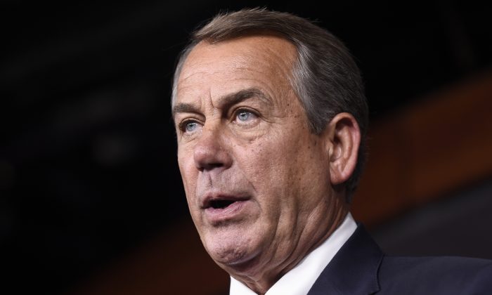 FILE - In this July 29, 2015 file photo, House Speaker John Boehner of Ohio speaks during a news conference on Capitol Hill in Washington.  (AP Photo/Susan Walsh, File)