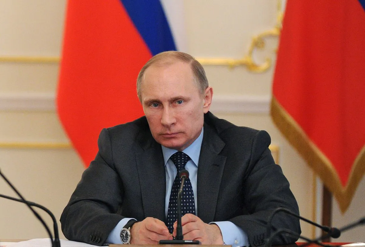 Russian President Vladimir Putin at a government meeting in the Novo-Ogaryovo residence outside Moscow, on March 26, 2014. (Mikhail Klimentyev/AFP/Getty Images)