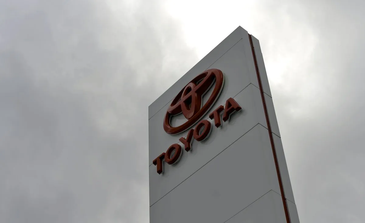 The Toyota logo on a sign outside a showroom in Sydney on February 11, 2014. (SAEED KHAN/AFP/Getty Images)