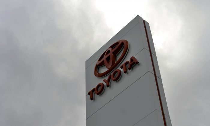 The Toyota logo on a sign outside a showroom in Sydney on February 11, 2014. (SAEED KHAN/AFP/Getty Images)