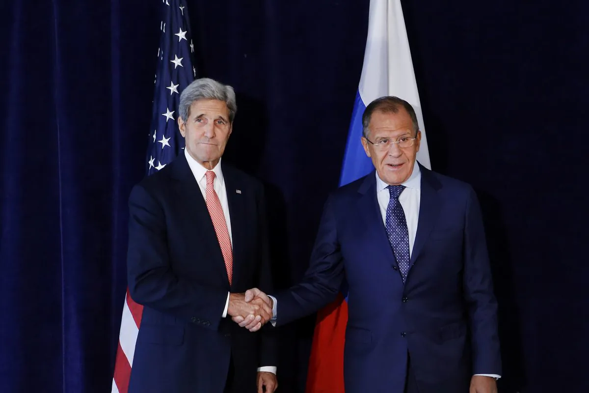 U.S. Secretary of State John Kerry, left, meets with Russian Foreign Minister Sergey Lavrov, Sunday, Sept. 27, 2015, in New York. (AP Photo/Jason DeCrow)