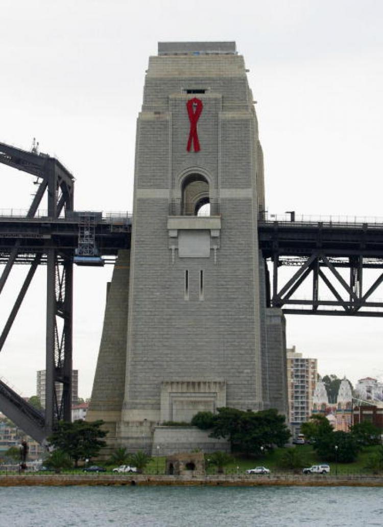 A ribbon to mark the anniversary of World Aids Day hangs from the northern pylon of the Sydney Harbour Bridge. (David Hancock/AFP/Getty Images) A ribbon to mark the anniversary of World Aids Day hangs from the northern pylon of the Sydney Harbour Bridge. (David Hancock/AFP/Getty Images)