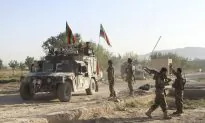 US Airstrikes Back Afghan Push to Retake City From Taliban