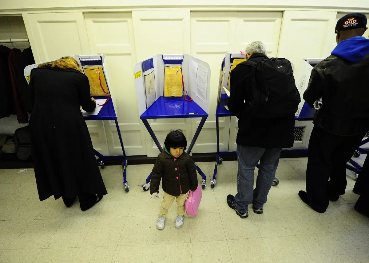Residents in New York cast their vote, file photo. (Emmanuel Dunand/AFP/Getty Images)