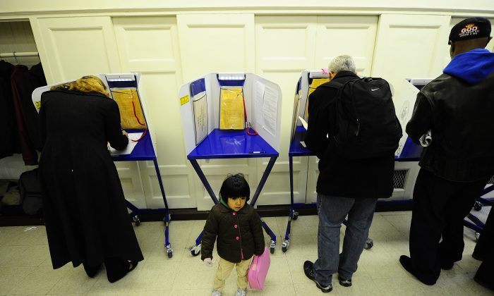 Residents in New York cast their vote, file photo. (Emmanuel Dunand/AFP/Getty Images)