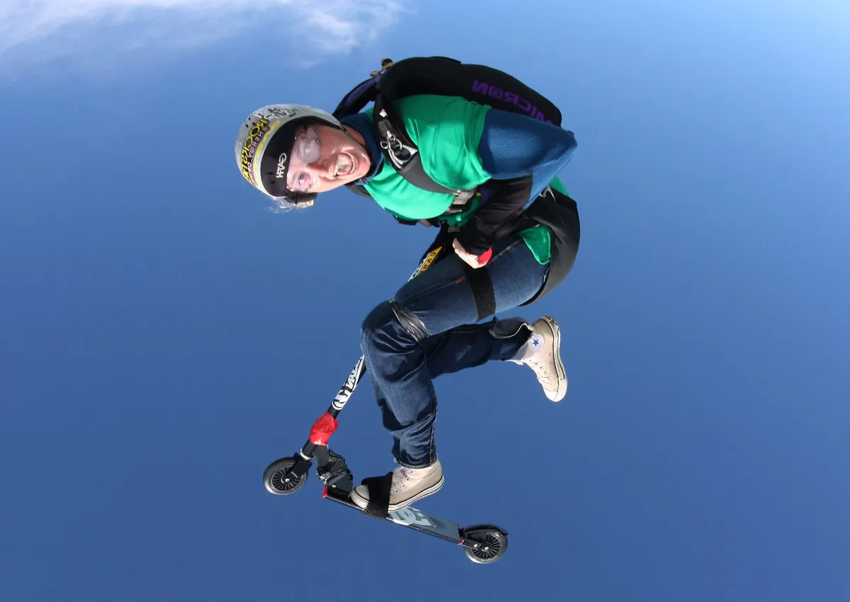 In this handout provided by Global Action Sports, Nitro Circus stars Joelene Van Vugt of Canada, Erik Roner of the USA and eight friends perform some extreme skydiving manoeuvres with a scooter to launch their extreme sport  '2011 Nitro Circus Live New Zealand Tour' on November 16, 2010 in Matamata , New Zealand. (Global Action Sports via Getty Images)