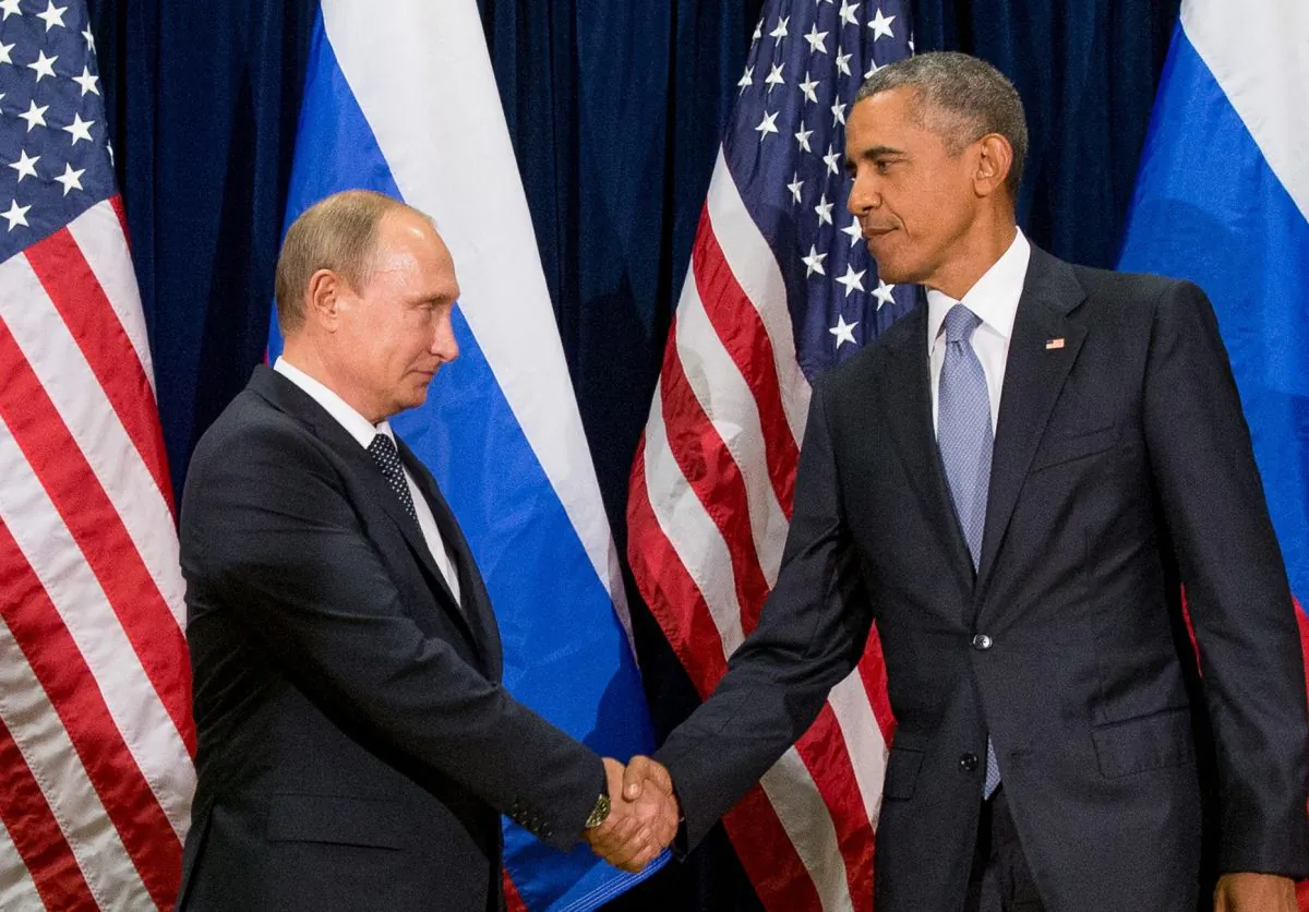 United States President Barack Obama (R) and Russia's President President Vladimir Putin pose for members of the media before a bilateral meeting at United Nations headquarters on Sept. 28, 2015. (AP Photo/Andrew Harnik)