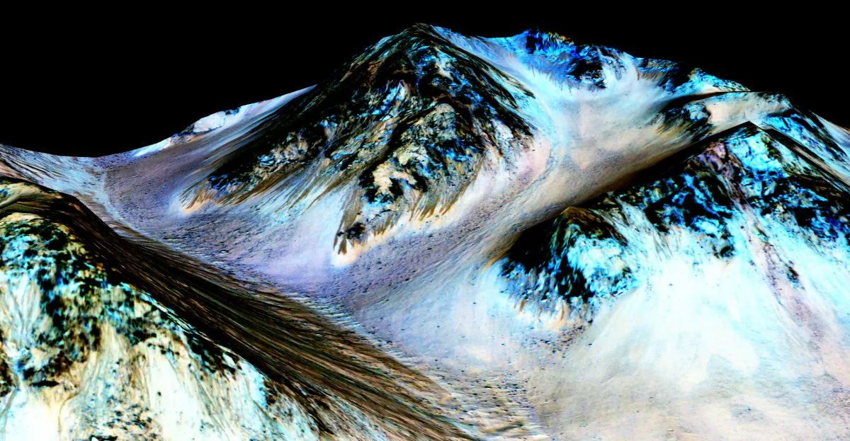 This digital false-colour image shows the dark, narrow streaks on Martian slopes inferred to be formed by seasonal flow of water on the planet. The streaks are roughly the length of a football field.(NASA/JPL-Caltech/Univ. of Arizona)