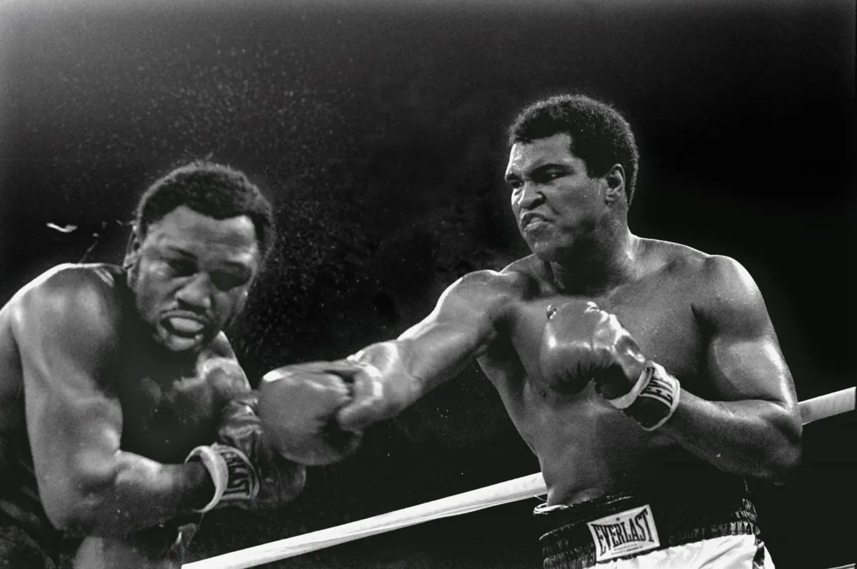 Muhammad Ali (R) may have officially won the third and final bout between him and Joe Frazier, but neither boxer was ever the same after. (AP Photo/Mitsunori Chigita)