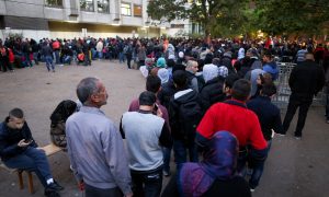 Germany Beefs Up Asylum Rules as Half a Million Cross Med