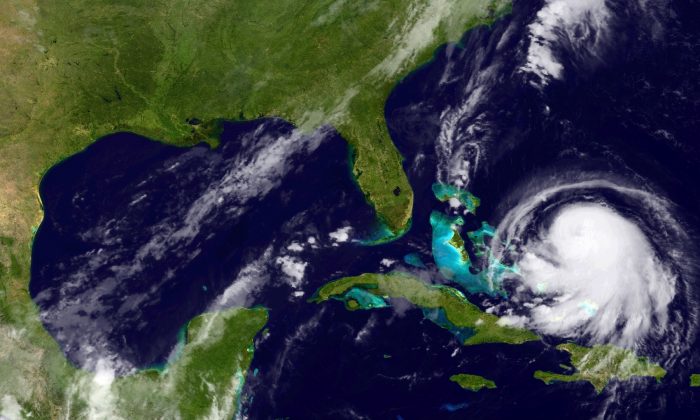 In this handout from the National Oceanic and Atmospheric Administration (NOAA), Hurricane Joaquin is seen chruning in the Caribbean September 30, 2015. (NOAA via Getty Images)