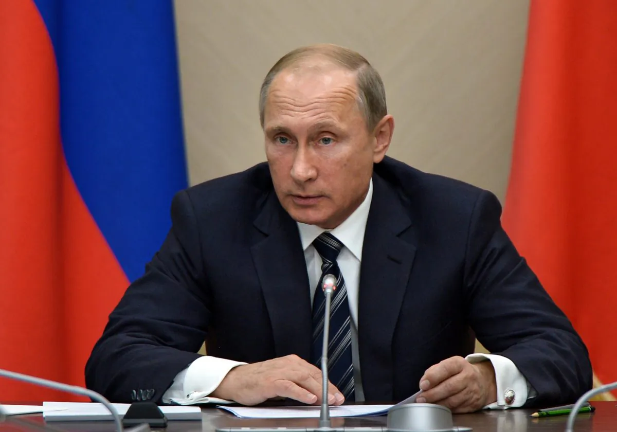 Russian President Vladimir Putin holds a meeting with senior government officials at the Novo-Ogaryovo residence outside Moscow, Russia on Wednesday, Sept. 30, 2015. (Alexei Nikolsky/RIA Novosti, Kremlin Pool Photo via AP)