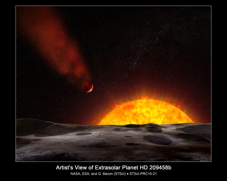 An illustration showing a view of the gas giant planet HD 209458b, as seen from the surface of a hypothetical nearby companion object. The planet is orbiting so close to its sunlike star that its heated atmosphere is escaping into space.  (Courtesy of ESA, G. Bacon/NASA.gov)