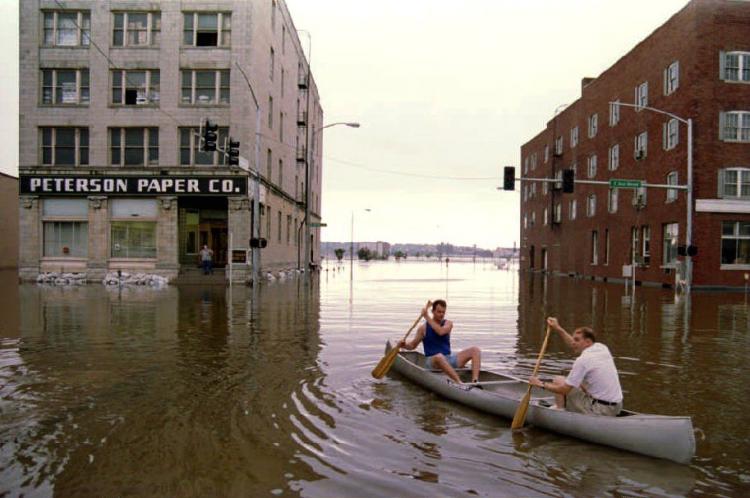 A scene from the Iowa flooding of July 1993 that previously held the record for Iowa's largest flood. A massive flooding due to heavy rain Wednesday morning in Ames, central Iowa, has broken the 1993 record.  (Chris Wilkins/Getty Images )
