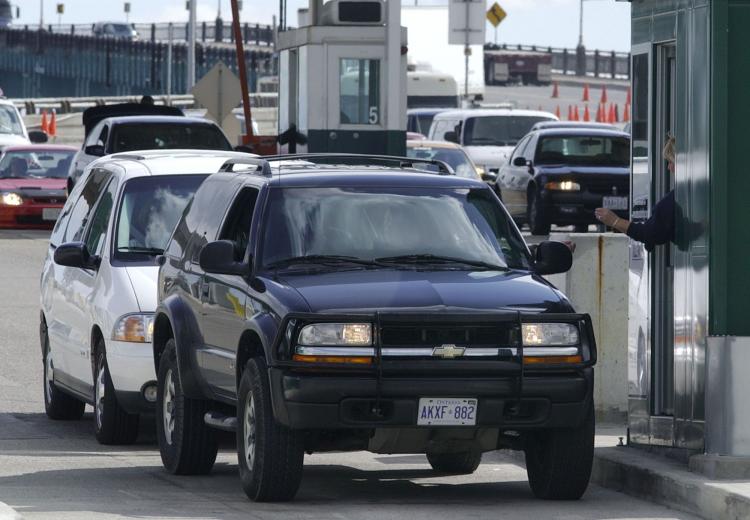 Vehicles stop at a border checkpoint in Detroit after crossing Ambassador Bridge which connects Detroit, Mich. and Windsor, Ont. With layers of new regulations and inspections often leading to long wait times, the Canadian Chamber of Commerce is calling f (Jeff Kowalsky/AFP/Getty Images) Vehicles stop at a border checkpoint in Detroit after crossing Ambassador Bridge which connects Detroit, Mich. and Windsor, Ont. With layers of new regulations and inspections often leading to long wait times, the Canadian Chamber of Commerce is calling f (Jeff Kowalsky/AFP/Getty Images)