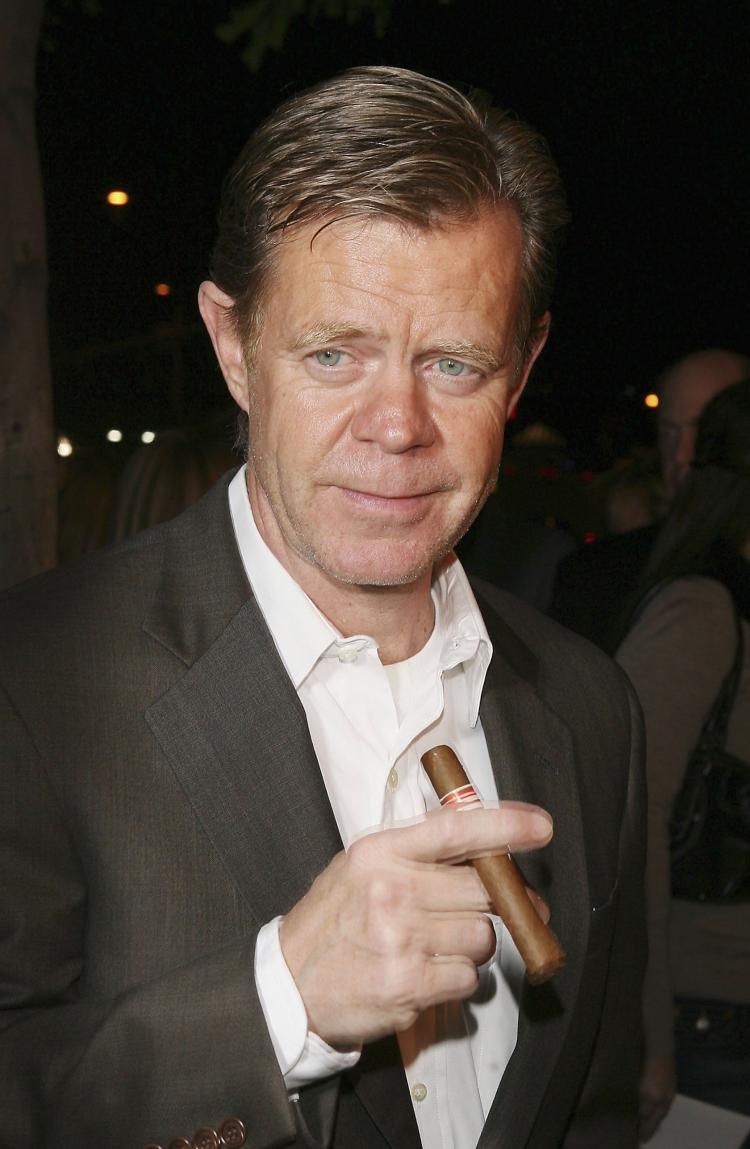 Actor William H. Macy holds a cigar as he arrives at the premiere of Fox Searchlight 'Thank You For Smoking' at the Directors Guild of America in March 2006 in Los Angeles. Health organizations in both Canada and the U.S. want the film industry to cut smo (Kevin Winter/Getty Images)