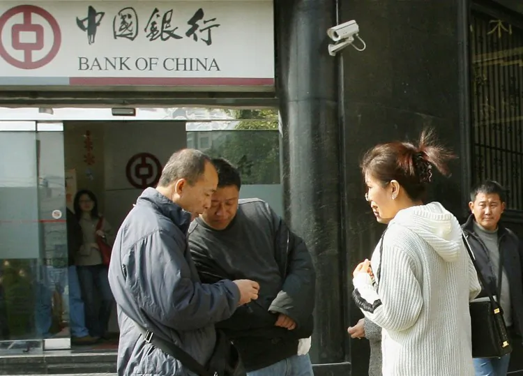 The number of Chinese bank institution commercial paper defaults surged in July 2023. (AFP/Getty Images)