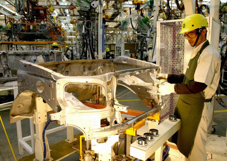 Thai employees working on the assembly line at the Toyota factory in Samutprakarn province. (AFP/Getty Images) Thai employees working on the assembly line at the Toyota factory in Samutprakarn province. (AFP/Getty Images)