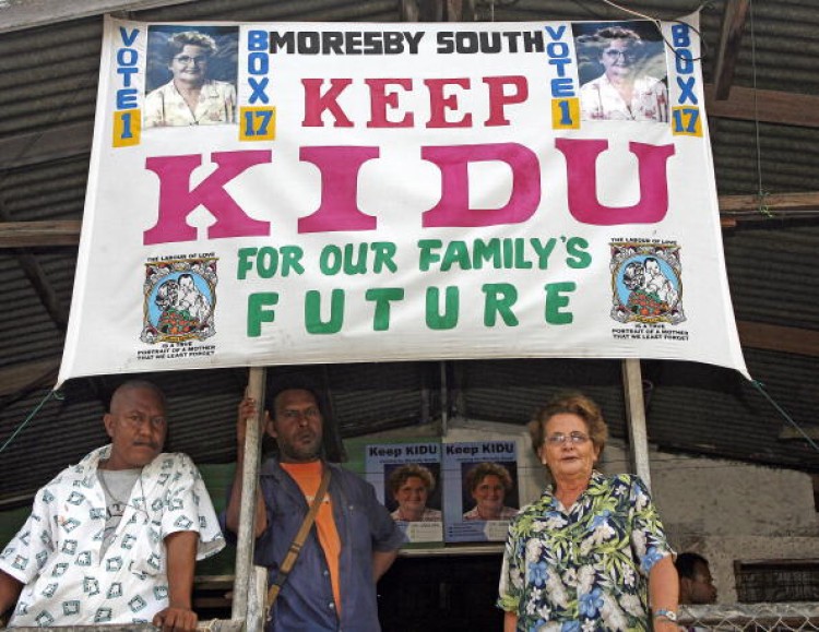 This photo taken 07 July, 2007 shows Australian-born Dame Carol Kidu (R) and supporters. (Torsten Blackwood/AFP/Getty Images) This photo taken 07 July, 2007 shows Australian-born Dame Carol Kidu (R) and supporters. (Torsten Blackwood/AFP/Getty Images)