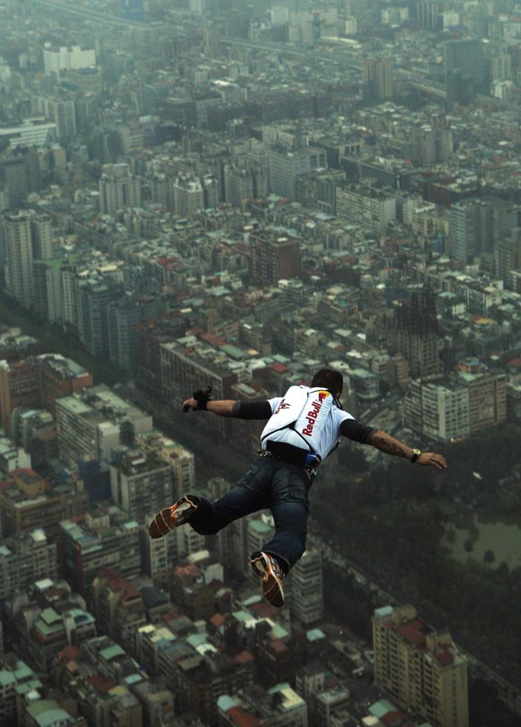 Felix Baumgartner, Austrian base jumper, makes a jump off the world's tallest completed building, the 508-meter high Taipei 101 Tower, Dec. 12, 2007 in Taipei,Taiwan. Later this year, Baumgartner plans to break the 50-year-old altitude record by jumping 120,000 feet. (Joerg Mitter/Getty Images)