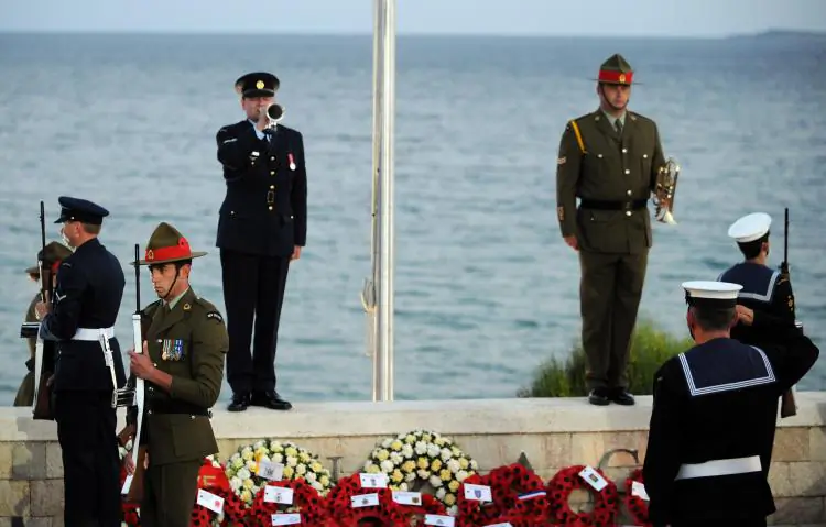 Australian soldiers stand guard as a bugle is played during an annual dawn ceremony at Anzac Cove where the first battle was fought in Gallipoli. (Burak Kara/Getty Images)