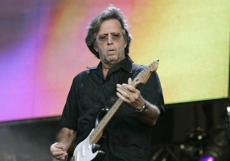 Eric Clapton performing in 2008 at The Hard Rock Calling Festival in London, England. The blues-rock guitarist and singer-songwriter, will release his 19th studio album, entitled 'Clapton' on Monday, September 27. (by Jo Hale/Getty Images) Eric Clapton performing in 2008 at The Hard Rock Calling Festival in London, England. The blues-rock guitarist and singer-songwriter, will release his 19th studio album, entitled 'Clapton' on Monday, September 27. (by Jo Hale/Getty Images)