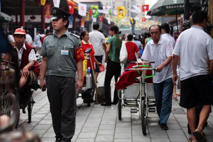 People have complained that there is a lack of festivity for the Games in Beijing. It seems most likely that those who are the happiest are the ones profiting from the games. ( Paula Bronstein/Getty Images) People have complained that there is a lack of festivity for the Games in Beijing. It seems most likely that those who are the happiest are the ones profiting from the games. ( Paula Bronstein/Getty Images)