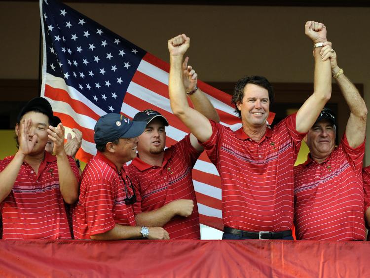 WE DID IT: U.S. captain Paul Azinger (second from right) celebrates with his team after beating Europe on Sunday. ( Timothy A. Clary/AFP/Getty Images) WE DID IT: U.S. captain Paul Azinger (second from right) celebrates with his team after beating Europe on Sunday. ( Timothy A. Clary/AFP/Getty Images)