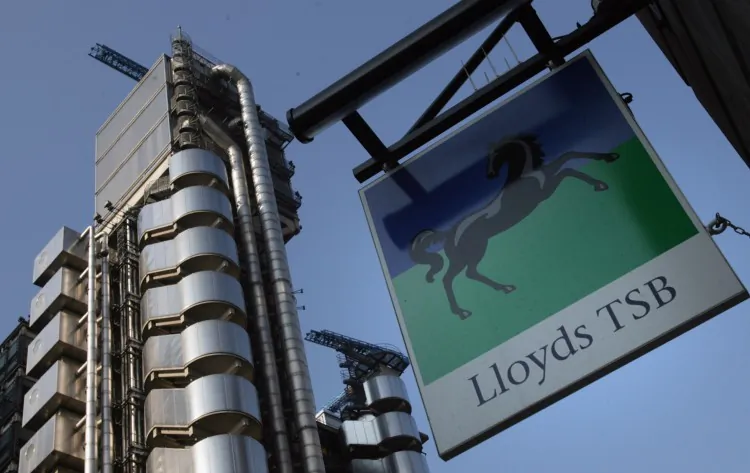 A Lloyds TSB bank sign is displayed outside a bank branch opposite the Lloyd's Building, the home of the insurance institution Lloyd's of London on Sept. 25, 2008, in London, England. (Matt Cardy/Getty Images)
