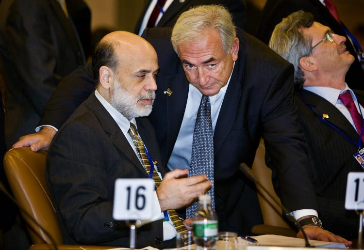 Federal Reserve Chairman Ben Bernanke speaks with Managing Director of IMF, Dominique Strauss before an IMF committee meeting where the hot topic was the world economy. (Stephen Jaffe/IMF via Getty Images) Federal Reserve Chairman Ben Bernanke speaks with Managing Director of IMF, Dominique Strauss before an IMF committee meeting where the hot topic was the world economy. (Stephen Jaffe/IMF via Getty Images)