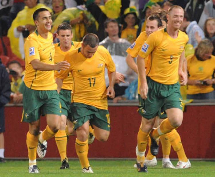 The Socceroos celebrate a goal by Tim Cahill during the 2010 FIFA World Cup qualifier match against Qatar. (David Hardenberg/Getty Images) The Socceroos celebrate a goal by Tim Cahill during the 2010 FIFA World Cup qualifier match against Qatar. (David Hardenberg/Getty Images)