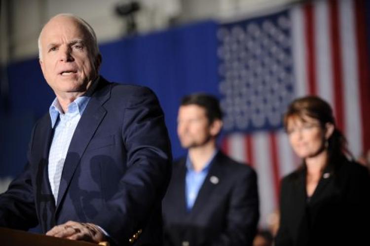 Republican presidential candidate John McCain speaks at a campaign rally in an airplane hangar at the airport in Cincinnati, Ohio on Oct. 22, 2008. At right are his running mate Sarah Palin and her husband Todd. (Robyn Beck/AFP/Getty Images) Republican presidential candidate John McCain speaks at a campaign rally in an airplane hangar at the airport in Cincinnati, Ohio on Oct. 22, 2008. At right are his running mate Sarah Palin and her husband Todd. (Robyn Beck/AFP/Getty Images)