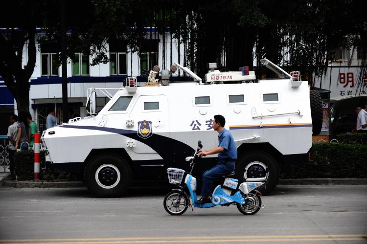An armoured personel carrier, parked outside a Shenzhen police station that was the center of protests. (AFP/Getty Images) An armoured personel carrier, parked outside a Shenzhen police station that was the center of protests. (AFP/Getty Images)