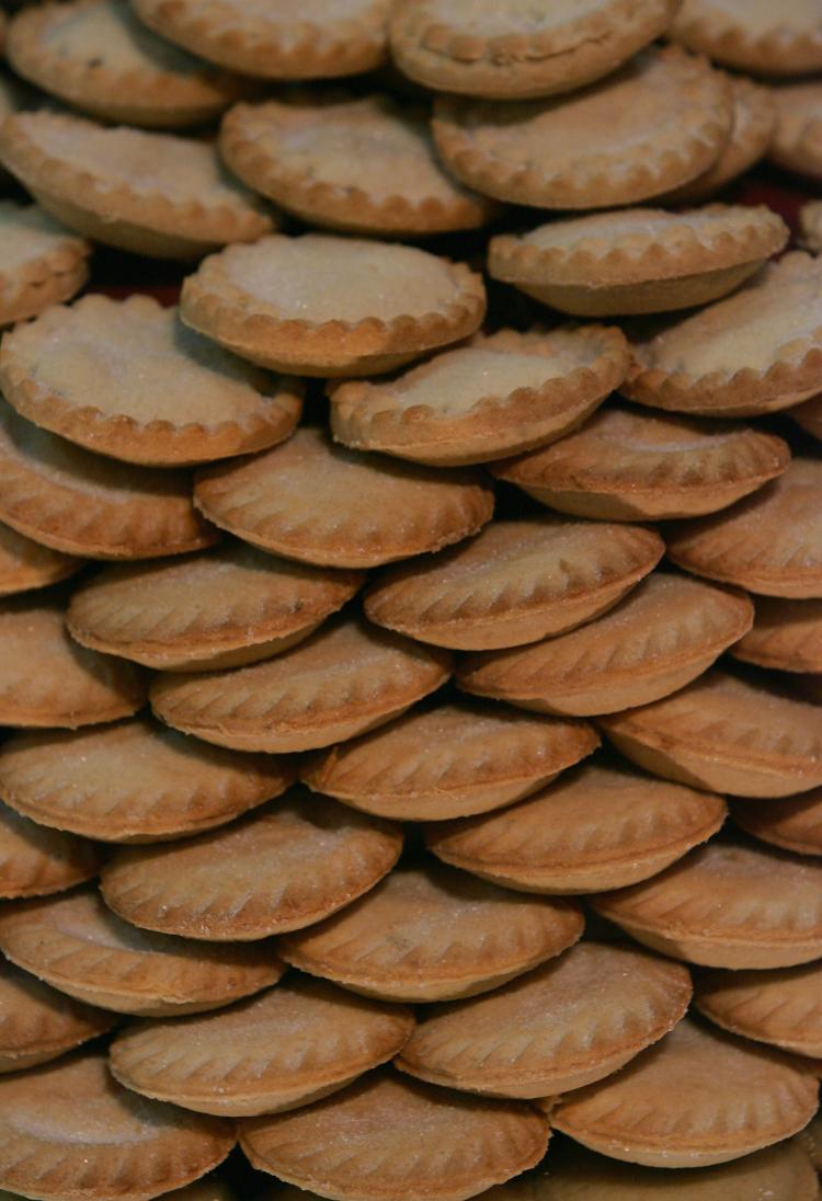 Mince pies are stacked up at the annual mince pie eating contest, in Wookey Hole, near Wells, England. (Matt Cardy/Getty Images) Mince pies are stacked up at the annual mince pie eating contest, in Wookey Hole, near Wells, England. (Matt Cardy/Getty Images)