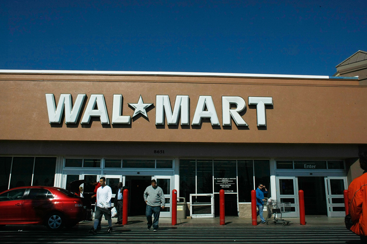 Wal Mart Customers exit a Walmart store in Miami