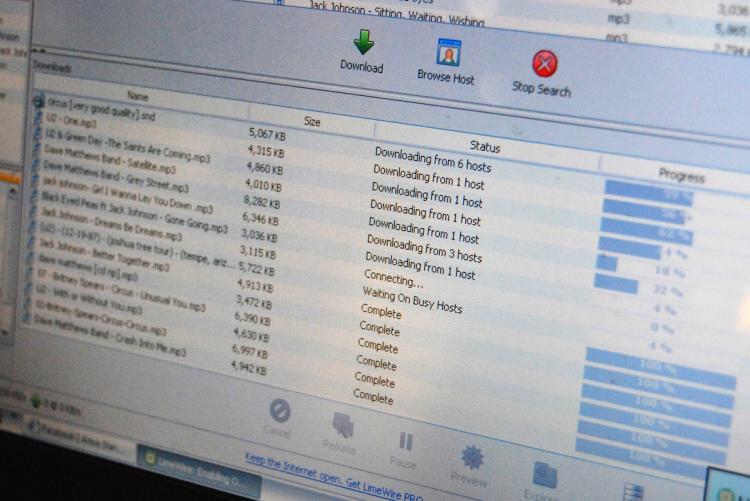 DOWNLOAD: A picture taken on March 2009 in Paris shows the screen of a computer showing a web site of downloading contents. Internet users who illegally download movies or music could be slapped with tough penalties. (Caroline Ventezou/Getty Images ) DOWNLOAD: A picture taken on March 2009 in Paris shows the screen of a computer showing a web site of downloading contents. Internet users who illegally download movies or music could be slapped with tough penalties. (Caroline Ventezou/Getty Images )