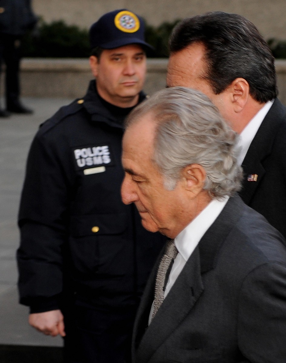 Disgraced Wall Street financier Bernard Madoff (C) arrives at a US Federal Court Disgraced Wall Street financier Bernard Madoff (C) arrives at a US Federal Court