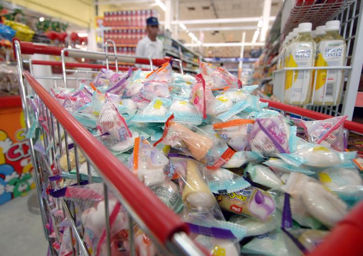Imported candy, manufactured in China is taken off the shelves in a supermarket by Indonesia's Drugs and Food Agency, locally know as Badan Pengawasan Obat dan Makanan (BPOM) in Denpasar on March 13, 2009. (Sonny Tumbelaka/AFP/Getty Images) Imported candy, manufactured in China is taken off the shelves in a supermarket by Indonesia's Drugs and Food Agency, locally know as Badan Pengawasan Obat dan Makanan (BPOM) in Denpasar on March 13, 2009. (Sonny Tumbelaka/AFP/Getty Images)